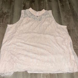 Not sure of the brand but it’s a light pink laced shirt